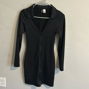Black zip up dress, shows off your curves and gives you a nice tight figure.